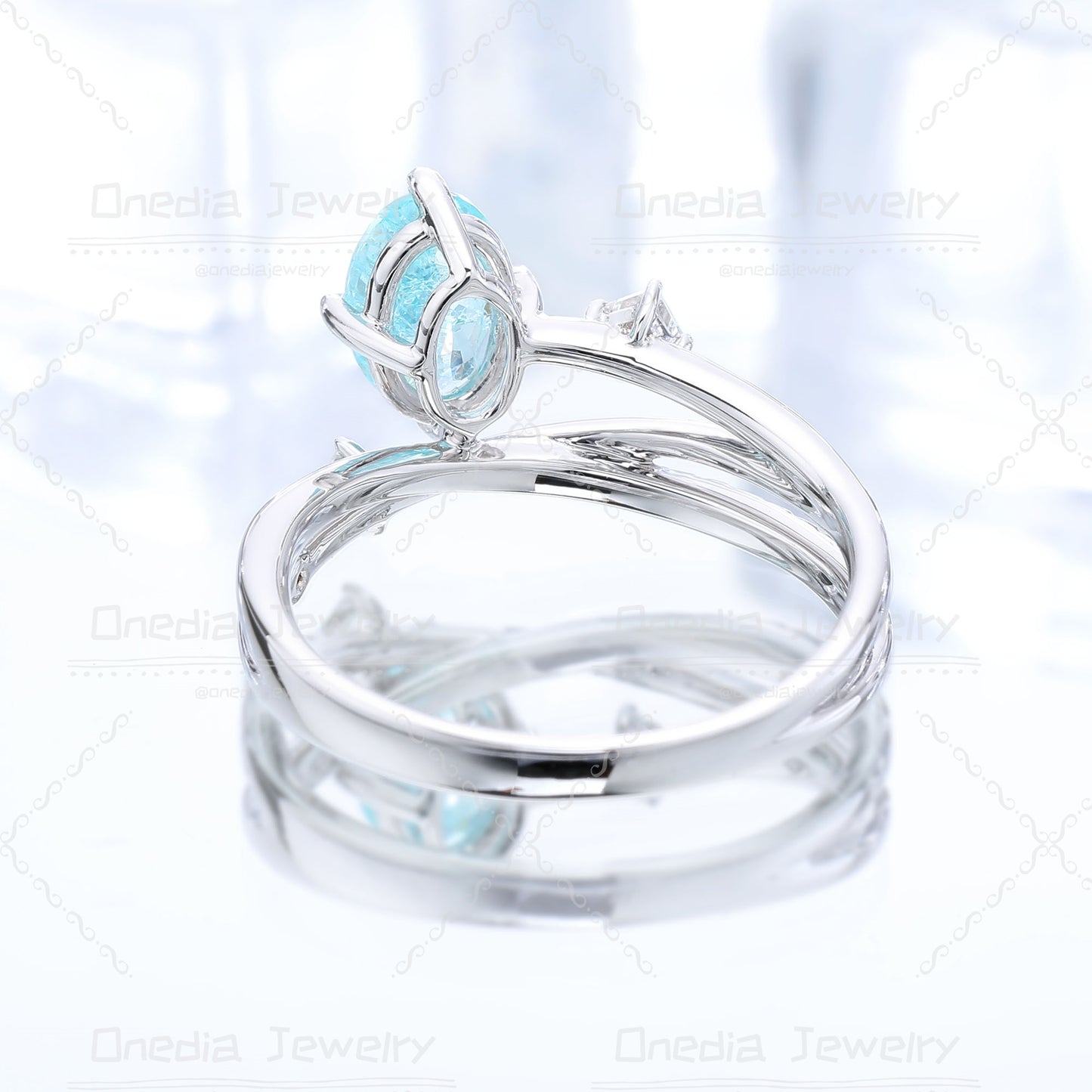 1ct Oval Lab Grown Paraiba color YAG Ice Blue 5x7mm Romantic Star design Engagement ring in 14k white gold
