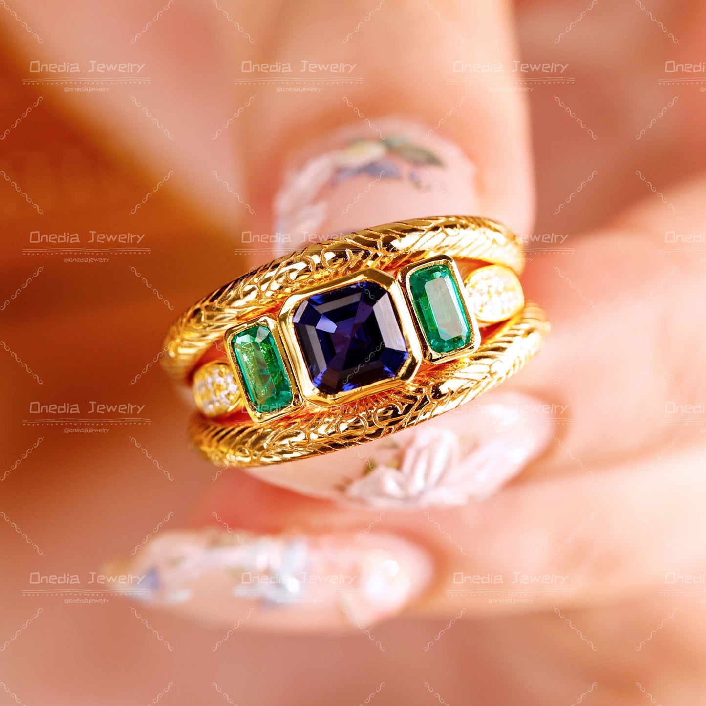 Three-Stone Emerald Cut Lab Grown Sapphire Ring with Matching Engraved Bands in 18K gold