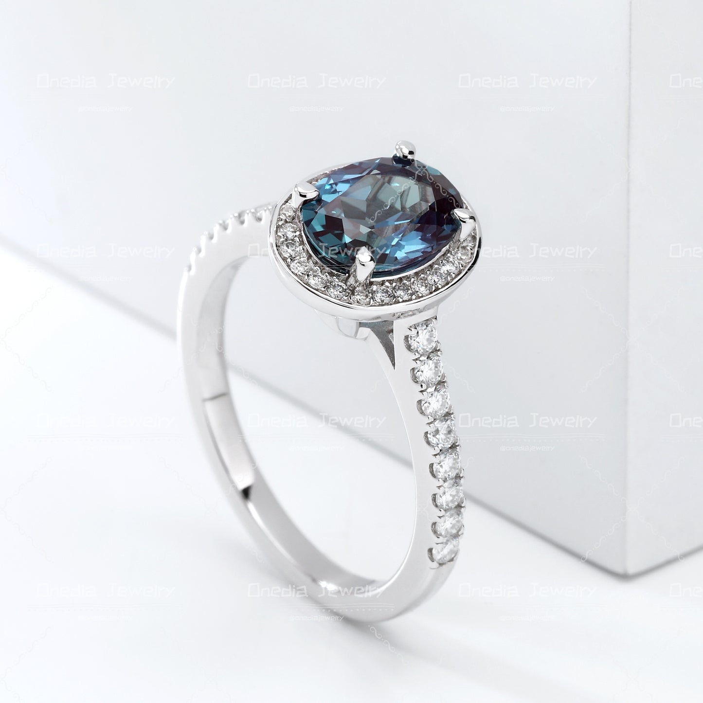 1.5ct Oval Lab Grown Alexandrite Teal color 6x8mm Classic Halo design Engagement ring in 18k white gold