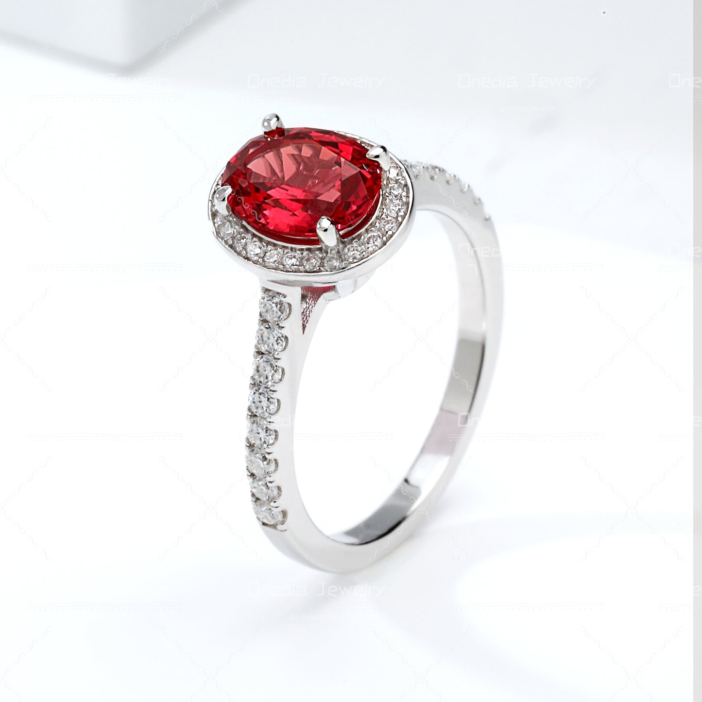 1.5ct Oval Lab Grown Sapphire Padparadscha 6x8mm Classic Halo design Engagement ring in 18k white gold