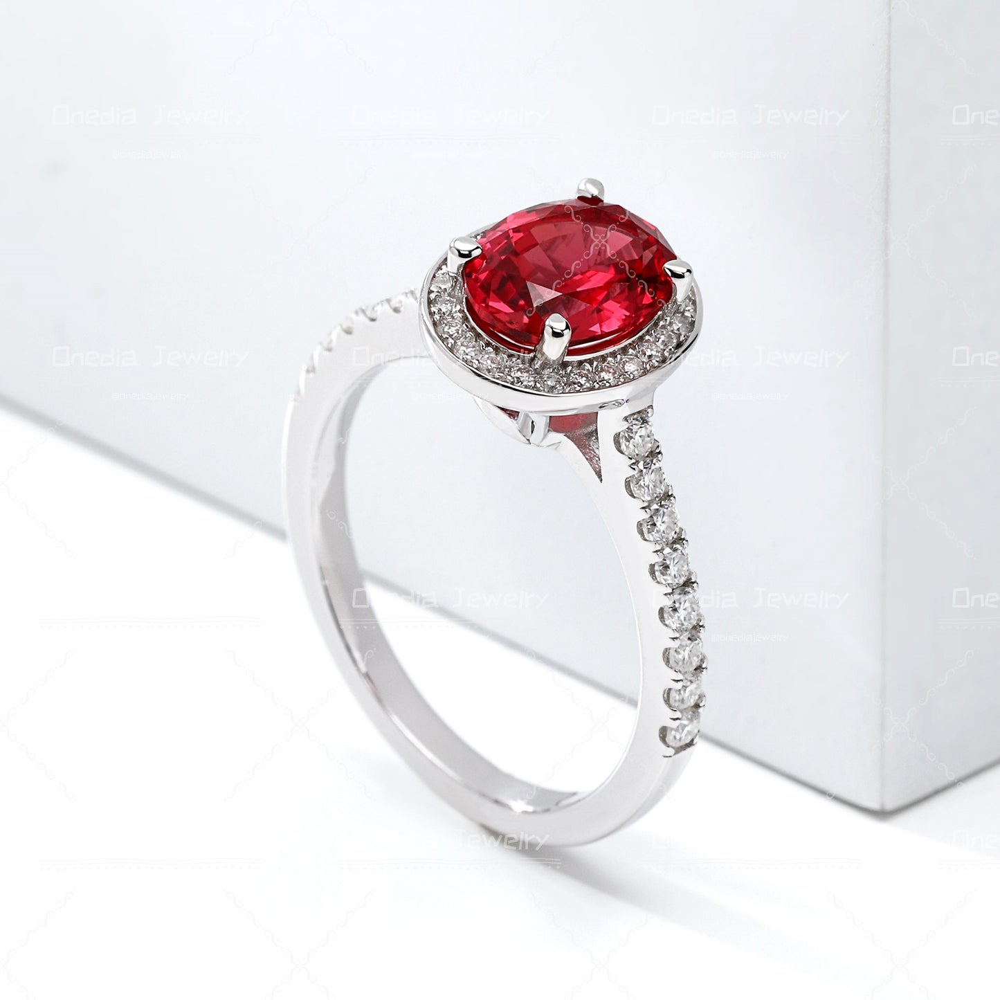 1.5ct Oval Lab Grown Sapphire Padparadscha 6x8mm Classic Halo design Engagement ring in 18k white gold
