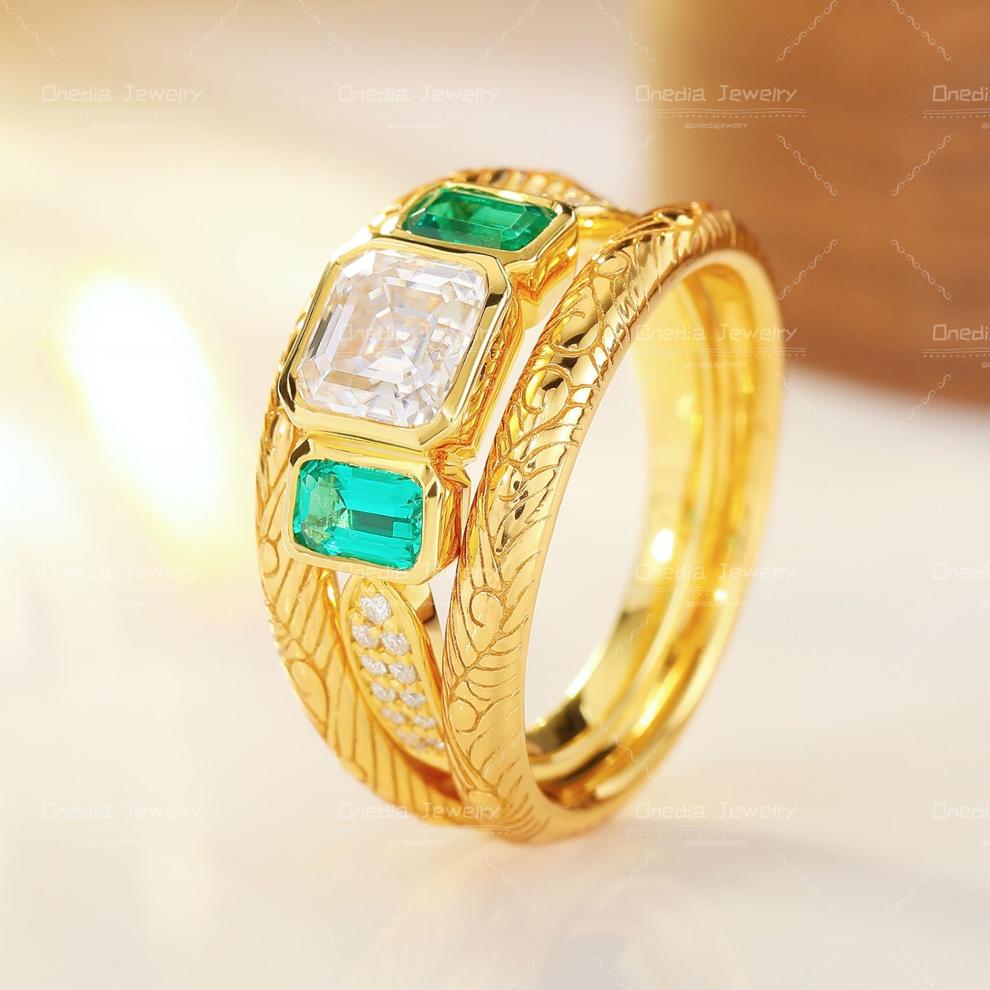 Three-Stone Emerald Cut Diamond Ring with Matching Engraved Bands in 18K gold