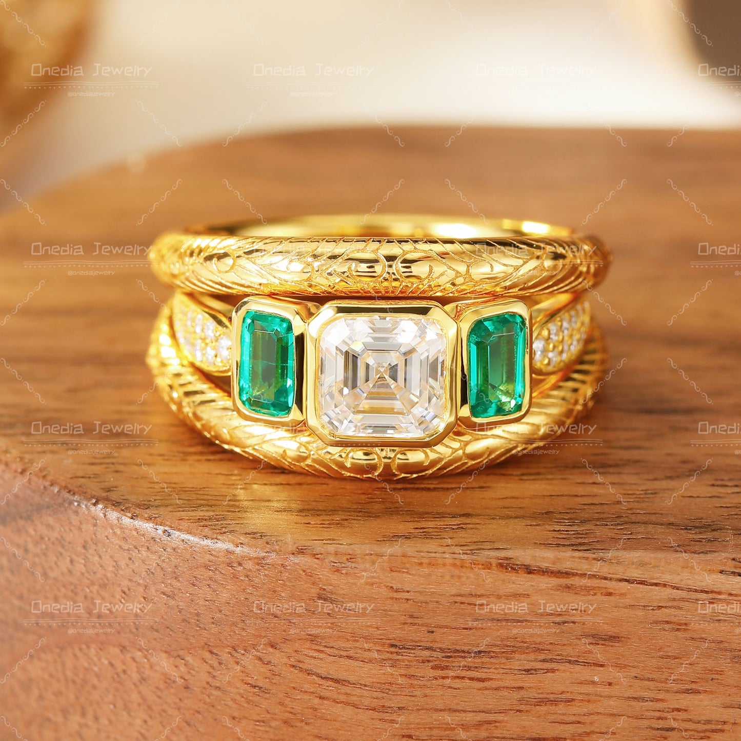 Three-Stone Emerald Cut Diamond Ring with Matching Engraved Bands in 18K gold