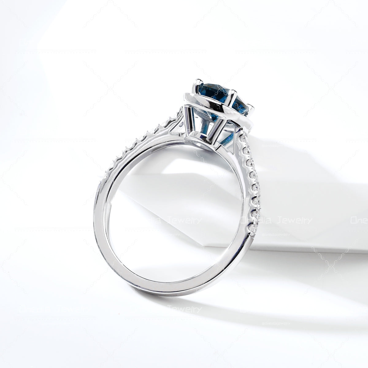 1.5ct Oval Lab Grown Alexandrite Teal color 6x8mm Classic Halo design Engagement ring in 18k white gold