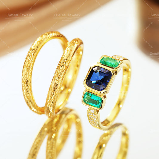 Three-Stone Emerald Cut Lab Grown Sapphire Ring with Matching Engraved Bands in 18K gold