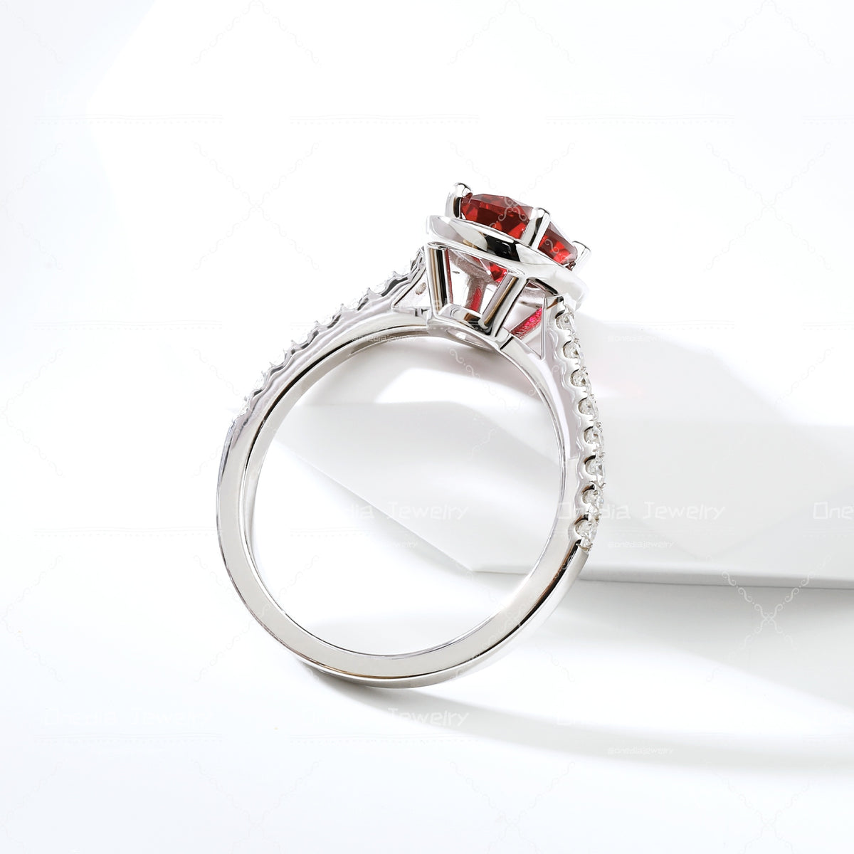 1.5ct Oval Lab Grown Sapphire Padparadscha 6x8mm Classic Halo design Engagement ring in 18k white gold