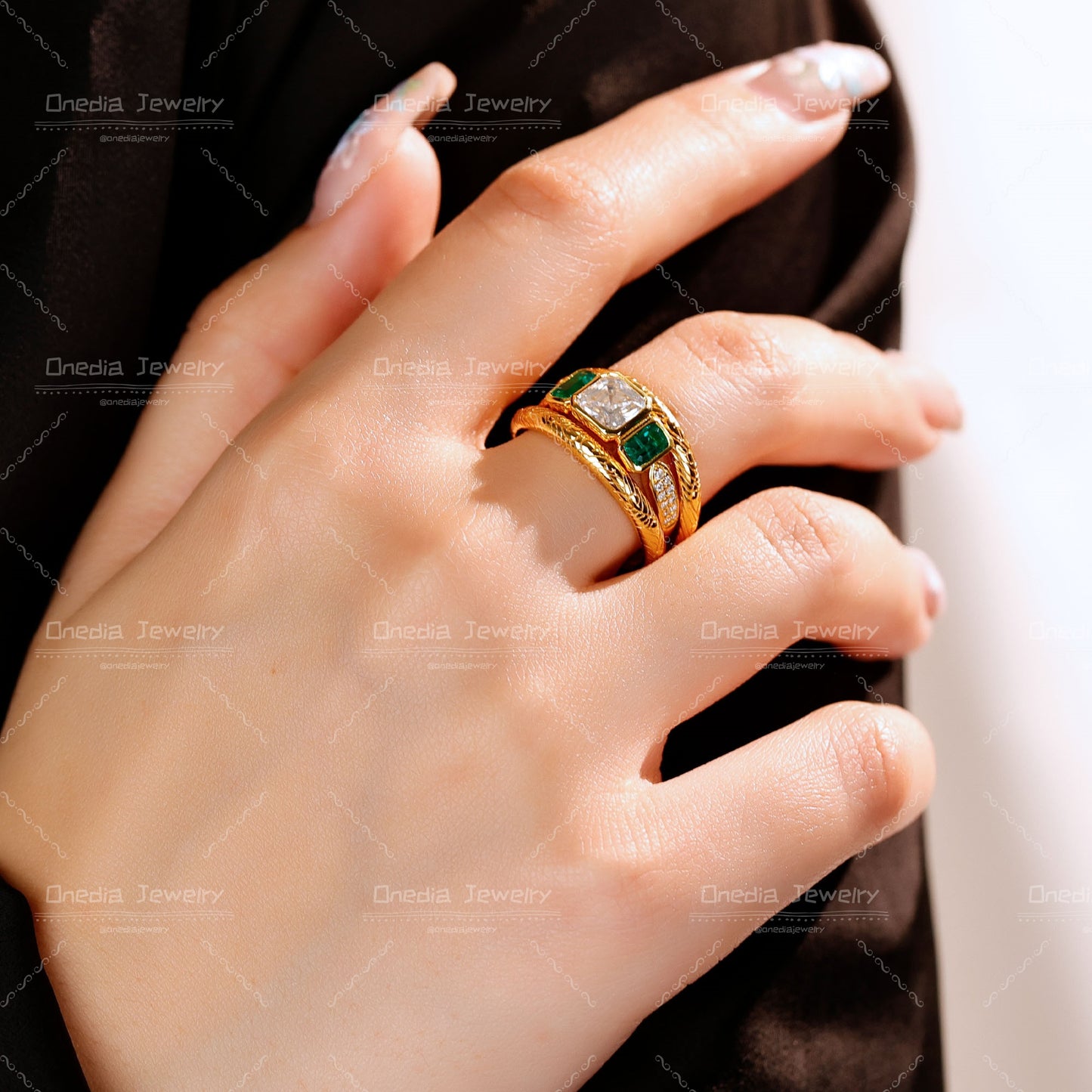 Three-Stone Emerald Cut Diamond Ring with Matching Engraved Bands in 18K gold