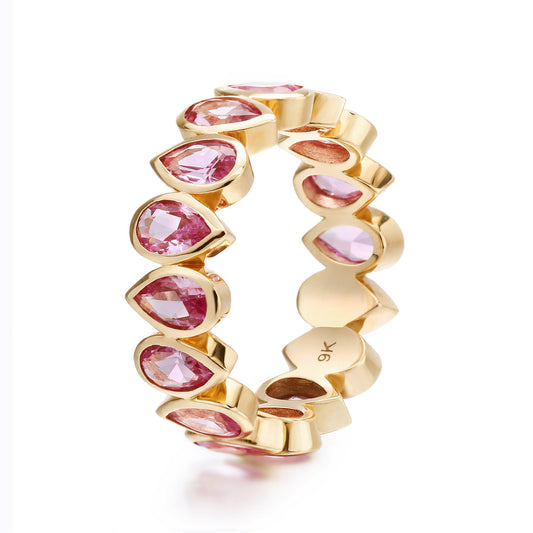 Bezel set Lab Grown Pink Sapphire 3x5 pear shaped eternity band ring in gold